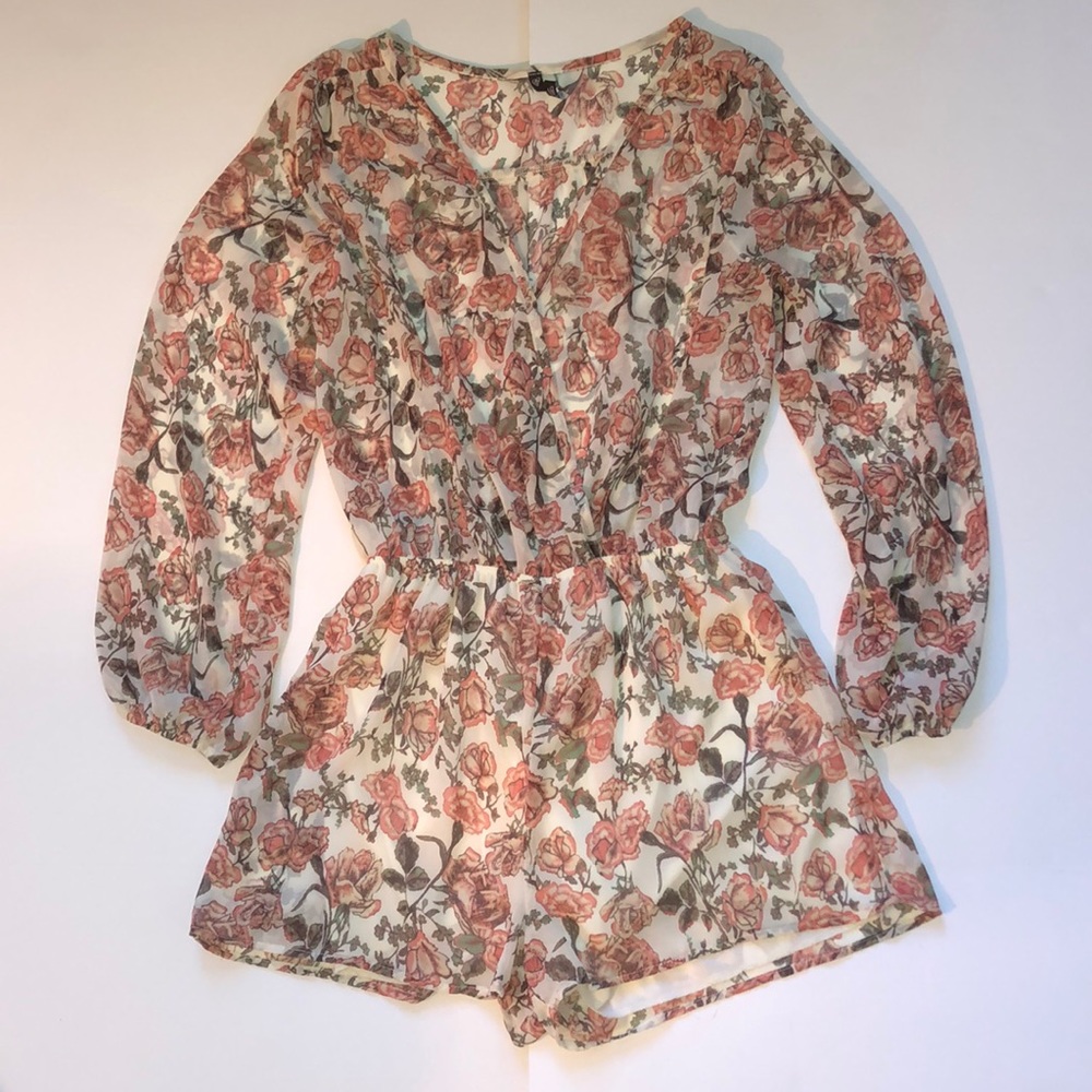 Long sleeved sheer top romper with deep V size M